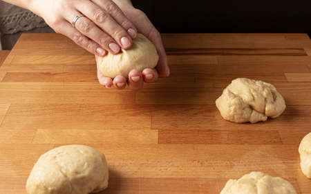 Mother and son making burger buns. Home cookingの写真素材