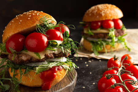 ready-made hot burger on the cutting boardの写真素材