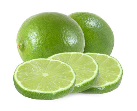 lime fruit slices isolated on a white backgroundの写真素材