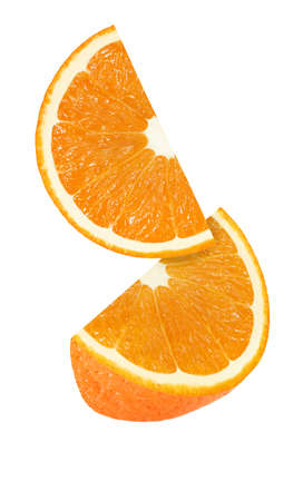 hanging, falling and flying piece of orange fruits isolated on white background with clipping pathの写真素材
