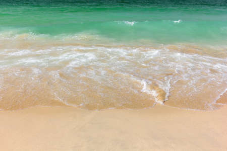beach on the Persian Gulf with turquoise water and sandの写真素材