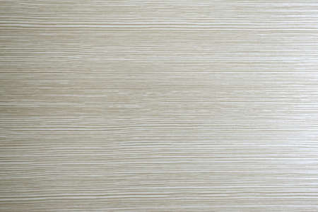 Background wood texture structure is light beige with horizontal fibers