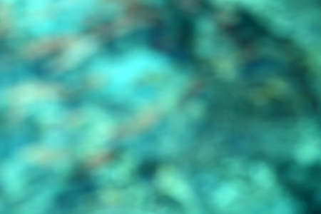 Background blurred abstract image of water turquoise surface.の写真素材