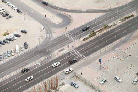 Roadway, motorway, cars on the road, intersection with traffic lights, top view.の写真素材