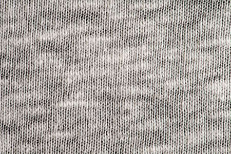 Knitted wool fabric, white threads, background structure, close-up macro viewの写真素材