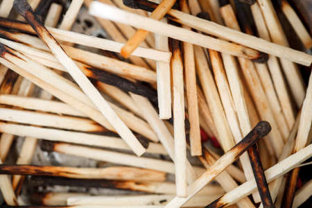 Burnt matches used, in bulk, macro close-up, selective focusの写真素材