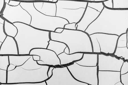 Cracked old white paint on metal, beautiful divorces, background abstract.の写真素材