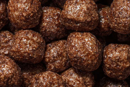 Corn balls in chocolate glaze close-upの写真素材