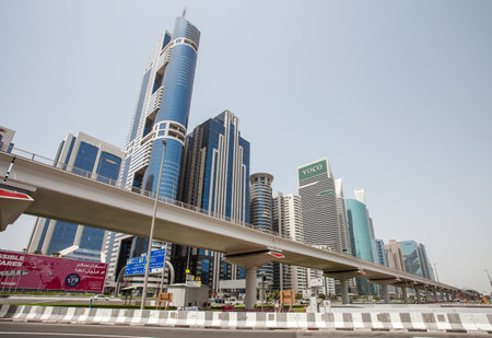 Dubai, UAE - April 17, 2022: Sheikh Zayed Road, hotel Voco, Grosvenor Tower, Blue Tower, metro, at...