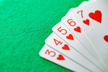 Combinations of cards in straight flush poker five cards from three to seven of suit of heartsの写真素材