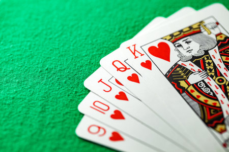 Playing cards, poker combination straight flush of hearts from the kingの写真素材