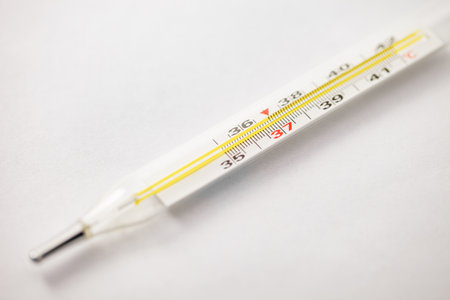Thermometer mercury for measuring human body temperature, close-up part selective focus