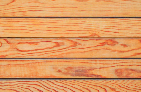 Background, wooden surface made of polished boards with texture, close-up, uniformの写真素材