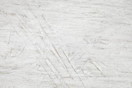 Plywood fiberboard roughly painted with white paint, background wallpaperの写真素材