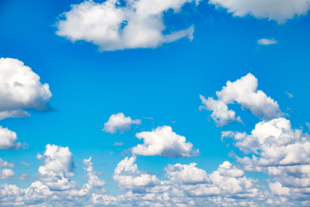 sky blue with cumulus white clouds