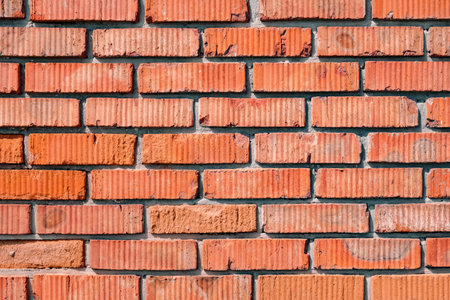 wall made of old orange brickwork, background textured