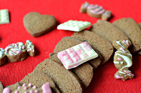 Vegan and gluten free speculoos biscuits (Belgian gingerbread cookies), decorated with white...