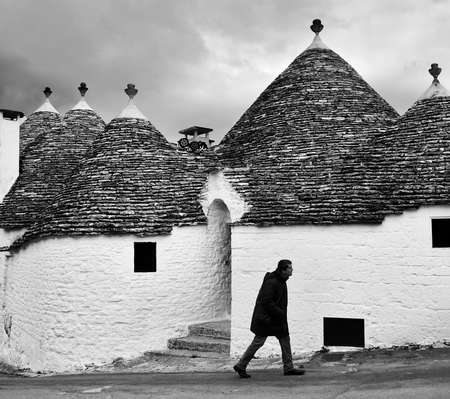 ALBEROBELLO, ITALY - FEBRUARY 11, 2019. Visiting unique houses of Alberobello, Puglia region, Italyのeditorial素材