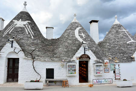 ALBEROBELLO, ITALY - FEBRUARY 11, 2019. Visiting unique houses of Alberobello, Puglia region, Italyのeditorial素材