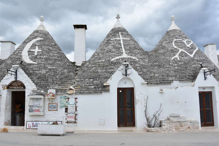 ALBEROBELLO, ITALY - FEBRUARY 11, 2019. Visiting unique houses of Alberobello, Puglia region, Italyのeditorial素材