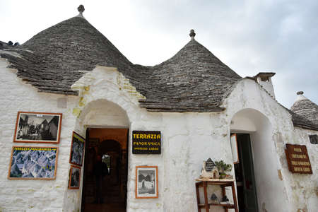 ALBEROBELLO, ITALY - FEBRUARY 11, 2019. Visiting unique houses of Alberobello, Puglia region, Italyのeditorial素材