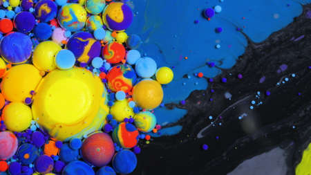 Slow Motion Beautiful Macro Surface Multicolored Red Blue Black And Yellow Bright Collors Paint Bubbles Universe Of Color Moving Oilの写真素材