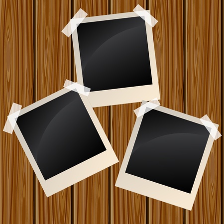 Blank photos on a wooden wallのイラスト素材
