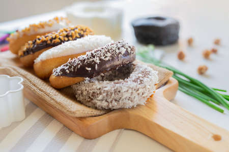 Chocolate Donut Bread Sprinkle with coconut and peanutsの写真素材