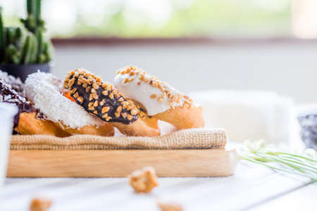 Donuts Bread Sprinkle with coconut and peanuts, Eat with fresh milk