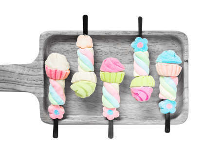 Marshmallow paste on wooden plate Colorful Pastel Tonesの写真素材