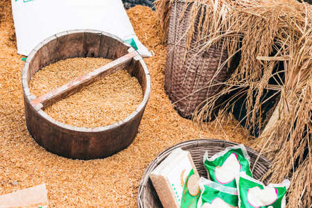 Paddy of farmers in the barrel wood Prepare to be packed into products sold to the marketの写真素材