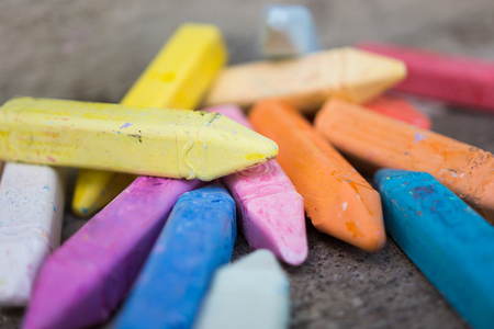 Random stack of multicolored sidewalk chalkの写真素材