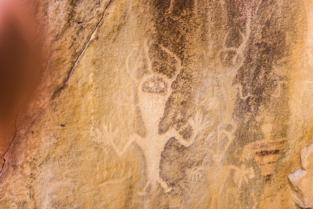 Rock carving of peopleの写真素材