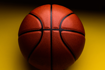 basketball ball on yellow background.の写真素材