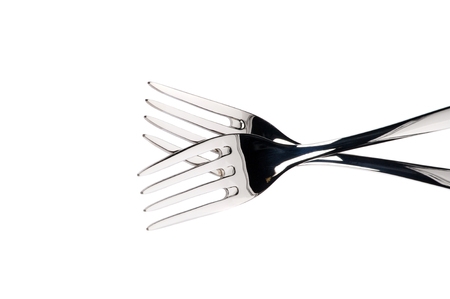 Steel fork isolated on white backgroundの写真素材