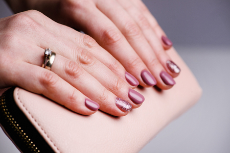 Nails Design. Hands With Bright Pink Spring Manicure On Grey Background. Close Up Of Female Hands. Art Nail.の写真素材
