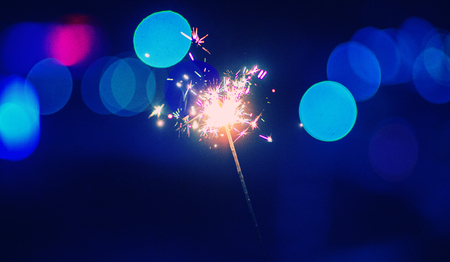 christmas sparkler glowing in the darkの写真素材