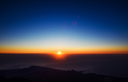 Amazing Sunrise in front of a sea, view from top of Tahtali mountain range. Tourist attraction of Turkey. KEMER ANTALYA TURKEY.の写真素材