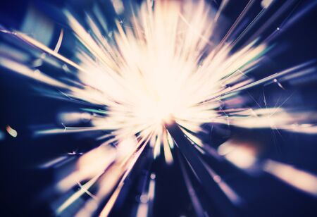 christmas sparkler glowing in the darkの写真素材