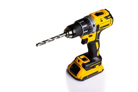 cordless drill and a drill on a white backgroundの写真素材
