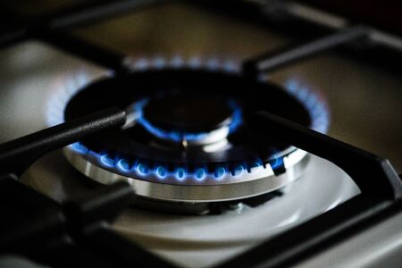 Natural gas burning on kitchen gas stoveの写真素材