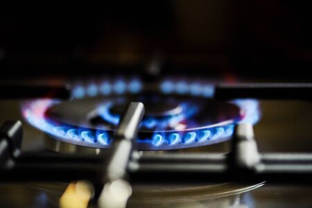 Natural gas burning on kitchen gas stoveの写真素材