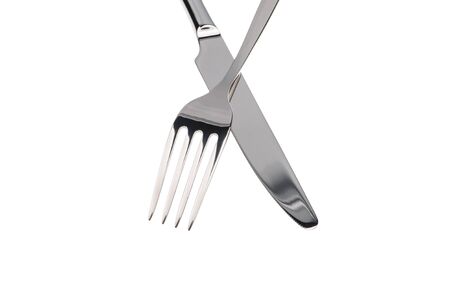 Set of fork, knife and spoons isolated on white.の写真素材