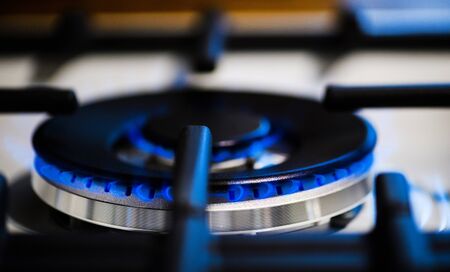 Natural gas burning on kitchen gas stoveの写真素材