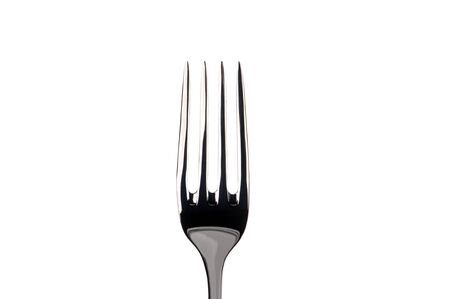 Steel fork isolated on white backgroundの写真素材