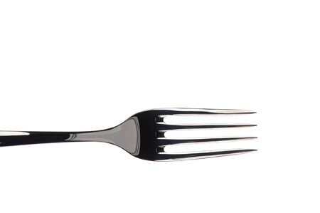 Steel fork isolated on white backgroundの写真素材