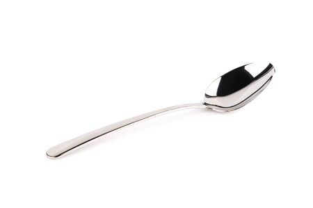 Steel spoon isolated on white backgroundの写真素材