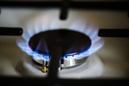 Natural gas burning on kitchen gas stoveの写真素材