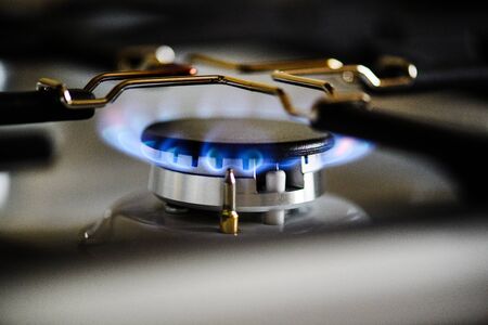 Natural gas burning on kitchen gas stoveの写真素材