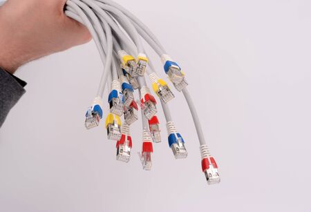 Colorful lan telecommunication cable RJ45 isolated on white backgroundの写真素材